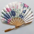 Japanese style folding fan with floral pattern and golden tassel on white background - No.7 Cyan