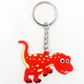 Cute red dinosaur keychain made of soft PVC with silver metal ring and yellow dots - Red Dinosaur