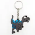 Cute grey PVC dinosaur keychain with blue stripes and silver metal keyring - Grey Dinosaur