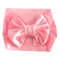 Soft pink velvet baby headband featuring a large decorative bow for infants - Pink