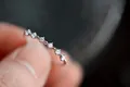 Delicate S925 sterling silver ring with seven sparkling round cubic zirconia stones - Port Size 6 / Silver