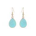 Close-up of light blue teardrop earrings with gold plating and sparkling stone inlay - Lake Blue