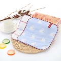 Blue cotton washcloth featuring white rabbit patterns and red wavy scalloped edges - Blue Little Bunny