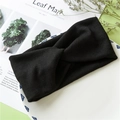 Classic black knitted twist headband featuring a ribbed texture for women's daily wear - Black