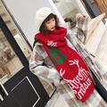 Winter red knitted Christmas scarf featuring white Merry Christmas text and green tree patterns - Burgundy