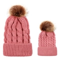 Detail of pink cable knit beanie hats for mother and child with brown faux fur pom poms - Parent-Child Set / Dusty Pink
