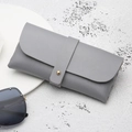 Sleek grey faux leather sunglasses pouch with litchi texture and golden snap button closure - Button Style / Gray