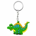 Cartoon dinosaurus sleutelhanger van groen PVC met blauwe strepen en metalen ring - Groene dinosaurus