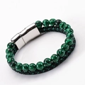 Macro detail of natural malachite beads and braided leather cord with magnetic metal clasp - Malachite