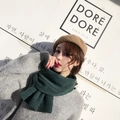 Chic short knit scarf in dark green color paired with a cozy winter woolen beret - Green