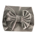 Detail of grey velvet baby headband showing soft fabric texture and large bow design - Gray