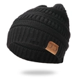 Black chunky knit beanie with a brown C.C leather patch on a plain white background - With Label / Black