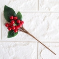 Artificial red berry branch with green leaves on white textured background for DIY decor - Small Leaf Red Berry