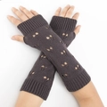 Detail of dark grey knitted fingerless arm warmers with hollow heart pattern - Dark Gray