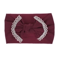 Close-up of soft burgundy nylon baby headband with a delicate white lace bow detail - Burgundy