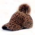 Women's leopard print baseball cap featuring a fluffy brown faux fur pom pom - Adjustable / Dark Coffee Leopard
