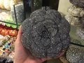 Close-up of a rose-shaped evening clutch bag with grey crystals and metal clasp - Dark Gray
