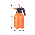 2L orange hand-held garden pressure sprayer with 31cm height and 13cm width dimensions - Orange 2L