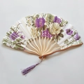 Japanese style folding fan with purple and green floral fabric and a bamboo handle with tassel - NO8 Bright Purple