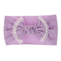 Detailed view of a soft purple baby nylon headband with a lace-trimmed bow. - Light Purple