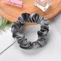 Gray velvet scrunchie hair tie with soft texture on a clean minimalist background - Gray