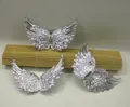 Detailed view of silver angel wing accessories with intricate feather textures for DIY crafts - Small 8cm (Single) / Silver