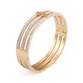 Elegante brazalete de tres capas en acero de titanio oro rosa con circonitas pavé - Dorado