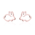 Macro shot of rose gold rabbit studs featuring minimalist hollow outlines and a polished finish - Rose Gold