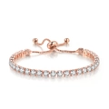 Detailed view of rose gold tennis bracelet with cubic zirconia and adjustable bolo clasp - 4mm Round White Stone / Rose Gold