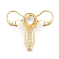 Gold-tone uterus brooch with heart-shaped rhinestones and pearls on white background - Gold