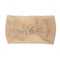 Primo piano di una fascia in morbido nylon color crema per neonati con fiocco - Bianco Sporco