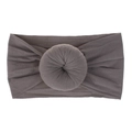 Detail of soft dark grey nylon baby headband with stretchy donut knot design - Gray