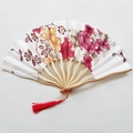 Japanese style bamboo folding fan featuring colorful floral patterns and a red silk tassel - NO13 Red Floral Vine