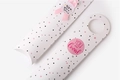 Detailed view of white paper pillow gift boxes with pink dots and ribbon decoration - Pillow Box / Candy Polka Dots