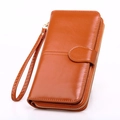 Brown oil leather long wallet for women with woven wristlet and zipper closure - Brown