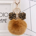 Detail of leopard print bow with rhinestones and fluffy brown fur ball keychain - Coffee Leopard