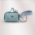 Mini light blue PU leather coin purse keychain with golden clasp and silver ring - Blue