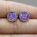 Minimalist 8mm purple sparkling round stud earrings held between fingers for size reference - Purple (8)