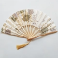Japanese style bamboo folding fan with floral print and elegant gold tassel on white background - NO10 Gold