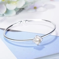 Bracciale rigido argento regolabile con fiore di loto e perla centrale decorativa - Perla