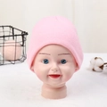 Pink knitted baby winter hat for toddlers aged 1-5 years with a warm candy-colored design - Adjustable / Light Pink