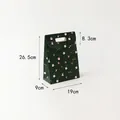 Dark green Christmas gift bag Size M with festive illustrations and handle, 19x9x26.5cm - Colorful Flip Bag-Green Medium