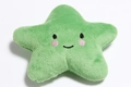 Close-up of green plush star pet toy with soft texture and embroidered smiling face - Green Star