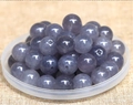 Macro view of translucent purple gemstone beads with pre-drilled holes for DIY jewelry - 10mm / Gray