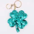 Glinsterende blauwe klaver sleutelhanger met pailletten en een gouden metalen sluiting - Klavertje Vier / Klavertje vier - Groen