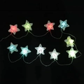 Catena luminosa a LED a stella con paillettes colorate e texture opaca su sfondo nero - Stella a cinque punte di perle / Colorato