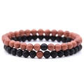 Bracelets de distance 6mm avec goldstone brune et perles noires mates sur blanc - Pierre de Sable Dorée