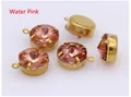 Close-up of four water red faceted glass gems in gold metal prong settings for DIY jewelry - Rose Red