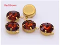 Macro detail of reddish brown faceted glass crystals in gold claw settings for DIY jewelry - Reddish Brown