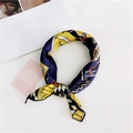Macro shot of modern art square silk scarf featuring blue and yellow geometric patterns - 37 Sweet Home